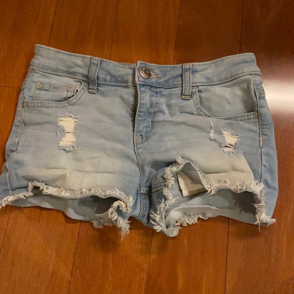 Light blue ripped denim shorts, size 2